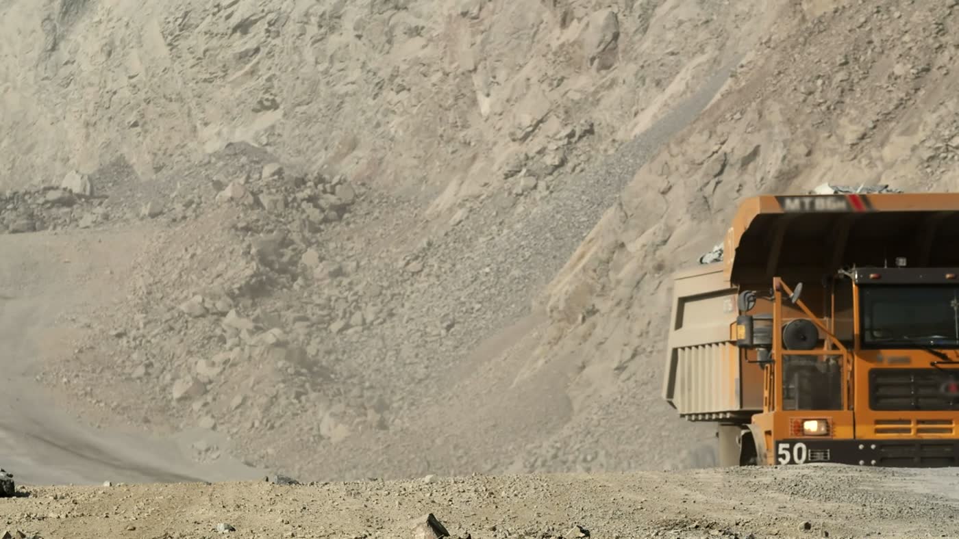 Site carrier hauling through a quarry